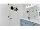 Bright bathroom with white cabinets and a modern mirror, showcasing a fresh design at 11440 Azalea Trl, Hampton, GA 30228