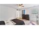 Bright bedroom with hardwood floors, and a large window, offering ample space at 11440 Azalea Trl, Hampton, GA 30228