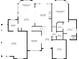 Layout of the first floor, showcasing the kitchen, dining room, living room, and primary bedroom at 11440 Azalea Trl, Hampton, GA 30228
