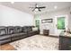 Finished basement with modern furniture, stylish decor, and access to the outdoors, perfect for entertainment at 2024 Towneship Trl, Roswell, GA 30075