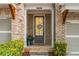Inviting front door with decorative wreath and well-maintained entryway at 2024 Towneship Trl, Roswell, GA 30075