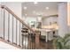 Open-concept kitchen with stainless steel appliances and a large island at 2024 Towneship Trl, Roswell, GA 30075