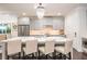 Modern kitchen featuring gray cabinets, a large island, and stainless steel appliances at 2024 Towneship Trl, Roswell, GA 30075