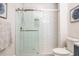Contemporary tiled shower with glass door and tiled shower niche at 2024 Towneship Trl, Roswell, GA 30075