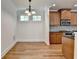 Dining area with hardwood floors and a traditional chandelier at 375 Causeway Ct, Suwanee, GA 30024