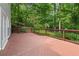 Backyard deck with backyard view, creating a serene outdoor oasis at 420 Windswept Ct, Roswell, GA 30075
