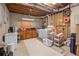 Basement area with laundry and utility features for a functional space at 420 Windswept Ct, Roswell, GA 30075