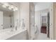 This bathroom offers a clean vanity and well-lit ambiance at 420 Windswept Ct, Roswell, GA 30075