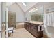 Bathroom with a double vanity, soaking tub, and walk-in shower at 420 Windswept Ct, Roswell, GA 30075