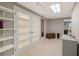 Hallway with a closet and natural light, providing an ample storage space at 420 Windswept Ct, Roswell, GA 30075