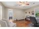 Another view of the functional home office with hardwood floors and ample space at 420 Windswept Ct, Roswell, GA 30075