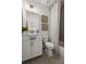 Modern bathroom features white vanity, sleek mirror, and stylish shower curtain at 4200 Legacy Ln # 22, Acworth, GA 30101