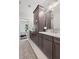 Well appointed bathroom featuring modern vanity and fixtures, with a view into the main bedroom at 4200 Legacy Ln # 22, Acworth, GA 30101