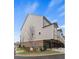 Beautiful three-story townhouse with well-maintained landscaping and a private garage at 4200 Legacy Ln # 22, Acworth, GA 30101