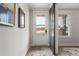 Stylish foyer featuring hardwood floors, a sliding barn door, and natural light through the front door at 4200 Legacy Ln # 22, Acworth, GA 30101