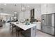 Bright kitchen features stainless steel appliances, large island with seating, and open floor plan at 4200 Legacy Ln # 22, Acworth, GA 30101