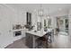 Modern kitchen features stainless steel appliances, waterfall island, pendant lighting and eat in bar at 4200 Legacy Ln # 22, Acworth, GA 30101