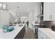 Contemporary kitchen with stainless steel appliances, an island with seating, and stylish pendant lighting at 4200 Legacy Ln # 22, Acworth, GA 30101