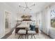 Stylish main bedroom featuring a decorative headboard, soft lighting, and serene atmosphere at 4200 Legacy Ln # 22, Acworth, GA 30101