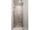 Tiled shower with beautiful tile patterns, a glass door and updated fixtures at 4200 Legacy Ln # 22, Acworth, GA 30101
