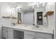 Double sink bathroom with modern fixtures and decor at 11255 Wittenridge Dr, Alpharetta, GA 30022