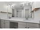 Bathroom features a double sink vanity with modern fixtures, a large mirror, and natural light at 11255 Wittenridge Dr, Alpharetta, GA 30022