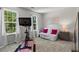 Versatile bonus room bathed in natural light, perfect for a home gym or office at 11255 Wittenridge Dr, Alpharetta, GA 30022