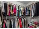 Walk-in closet featuring ample hanging space and shelving for organized storage at 11255 Wittenridge Dr, Alpharetta, GA 30022