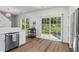 Bright kitchen with stainless steel appliances and slider to the back yard at 11255 Wittenridge Dr, Alpharetta, GA 30022