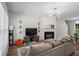 Comfortable living room with a fireplace and stylish decor, showcasing a warm and inviting space at 11255 Wittenridge Dr, Alpharetta, GA 30022