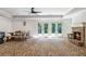 Inviting basement with brick floors, fireplace, and a dining table at 2370 Bradwardine Ct, Cumming, GA 30041