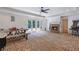 Large basement with brick flooring, a fireplace, and French doors to the outside at 2370 Bradwardine Ct, Cumming, GA 30041
