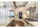 Gourmet kitchen with granite countertops, stainless steel appliances, and custom cabinetry at 2370 Bradwardine Ct, Cumming, GA 30041