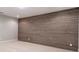 Modern empty room features wall paneling and neutral colors at 2370 Bradwardine Ct, Cumming, GA 30041