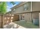 View of the back of the house with wooden deck, sliding glass door, and AC unit at 3200 Seven Pines Ct # 103, Atlanta, GA 30339