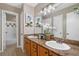 Spacious bathroom with double sinks, granite countertops, and ample cabinet space at 3200 Seven Pines Ct # 103, Atlanta, GA 30339