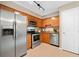 Modern kitchen with stainless steel appliances, granite countertops, and ample cabinet space at 3200 Seven Pines Ct # 103, Atlanta, GA 30339