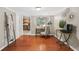 Cozy study nook with desk and chair setup, featuring hardwood floors and stylish decor at 3200 Seven Pines Ct # 103, Atlanta, GA 30339