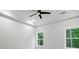 Bedroom featuring crown molding and natural light coming through the windows at 3902 Bouldercrest Se Rd, Ellenwood, GA 30294