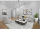 Tastefully decorated living room with neutral tones, stylish furniture, and hardwood flooring at 3902 Bouldercrest Se Rd, Ellenwood, GA 30294