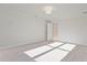 Bedroom features neutral decor, carpet flooring and natural light at 213 Admor Ln, Acworth, GA 30102