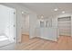 Open bonus room area featuring wood floors, an open closet, and neutral decor at 213 Admor Ln, Acworth, GA 30102