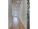 Inviting entryway with beautiful hardwood floors leads to a bright, open living space at 213 Admor Ln, Acworth, GA 30102