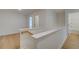 Upstairs hallway with hardwood floors and multiple doorways leading to rooms at 213 Admor Ln, Acworth, GA 30102