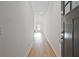Bright hallway featuring hardwood floors and views into the open floorplan at 213 Admor Ln, Acworth, GA 30102