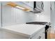 Modern kitchen with white countertops and chevron tile backsplash at 213 Admor Ln, Acworth, GA 30102