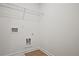 Laundry room with hookups and storage rack at 213 Admor Ln, Acworth, GA 30102