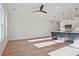 Spacious room featuring hardwood floors, a kitchen island, recessed lighting, and natural light at 213 Admor Ln, Acworth, GA 30102