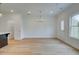 Open living space with access to the dining area and a bright, airy feel at 213 Admor Ln, Acworth, GA 30102