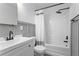 Bathroom with a modern vanity, matching fixtures and a shower-tub combo with a white shower curtain at 2565 Bates Se St, Smyrna, GA 30080